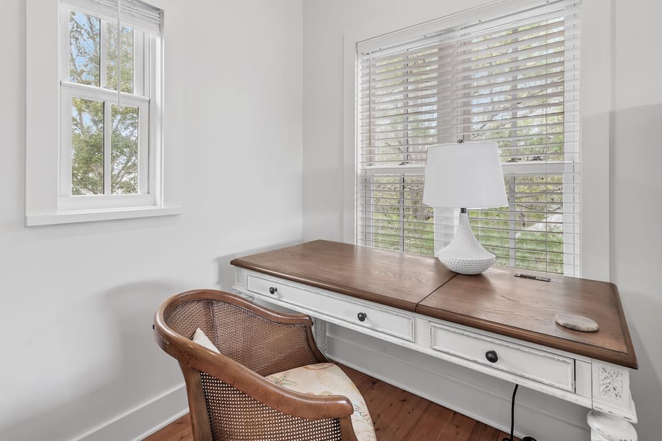 Dedicated workspace in the upstairs master bedroom. Lifts into a standing desk.