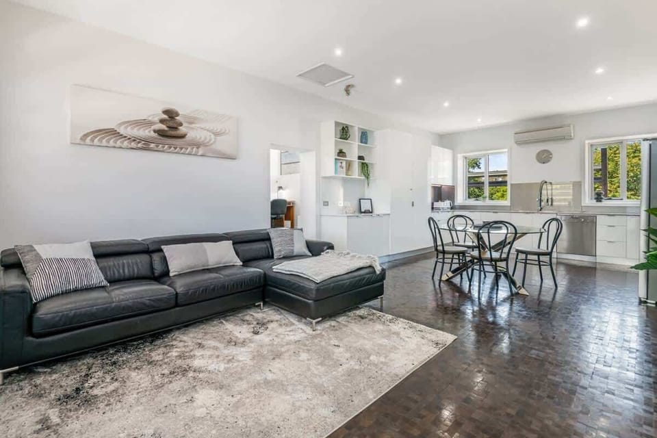 Living, dining and kitchen space.