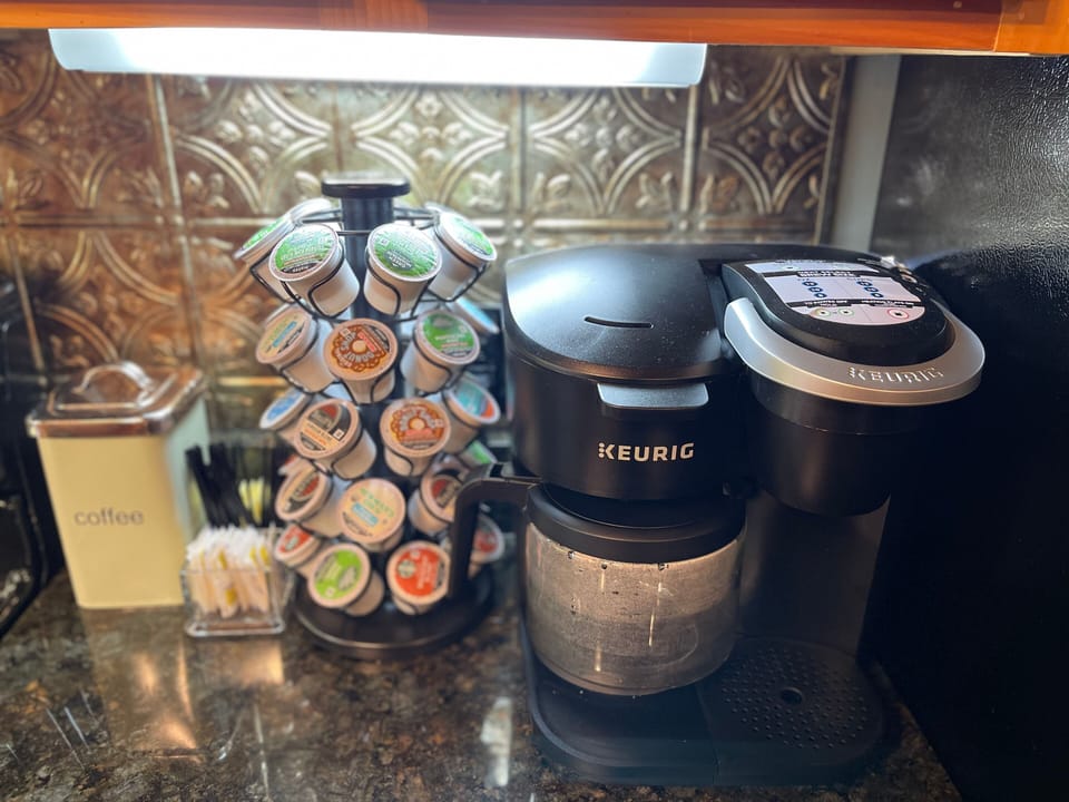 Fully stocked Keurig coffee station for your morning pick-me-up.