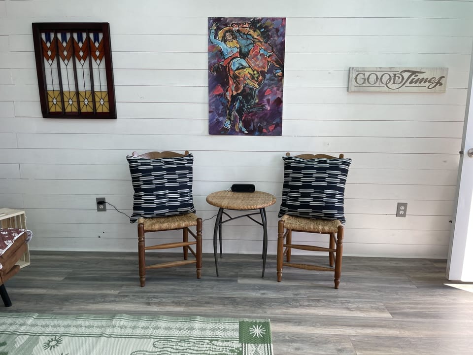 Extra seating, blue tooth speaker, corn hole, lawn chairs, dog kennels.