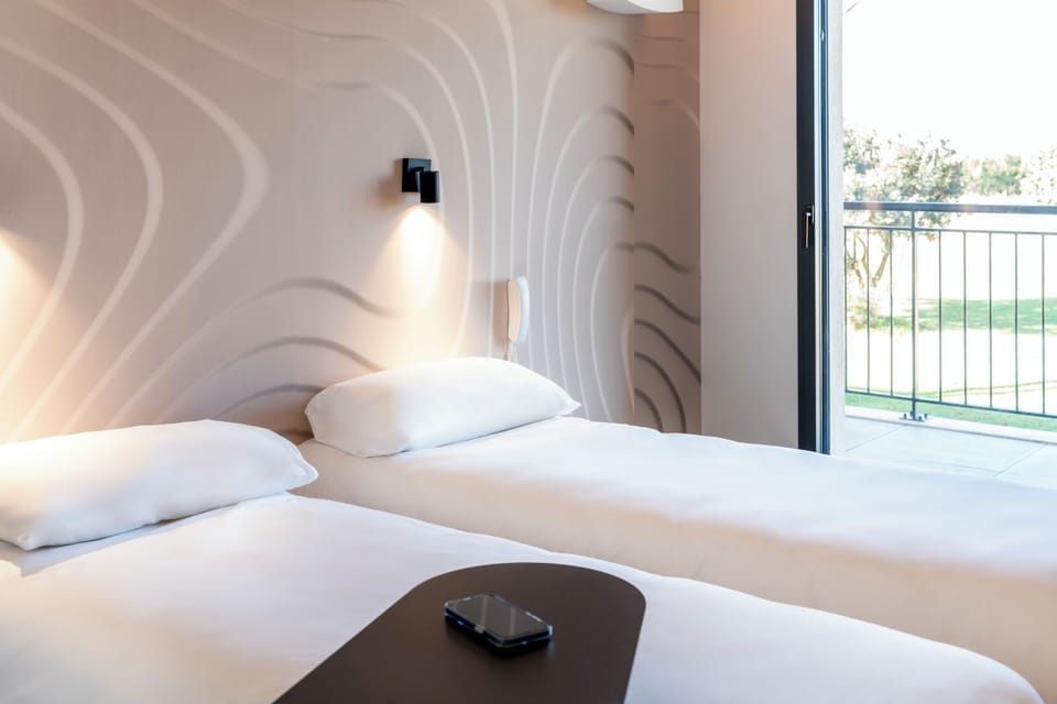 Comfort Twin Room, Balcony | Premium bedding, pillowtop beds, individually decorated