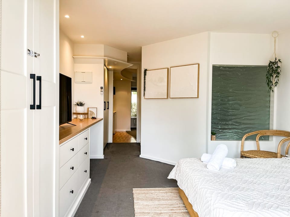 Main bedroom. Sliding door separating from second bedroom/kitchenette