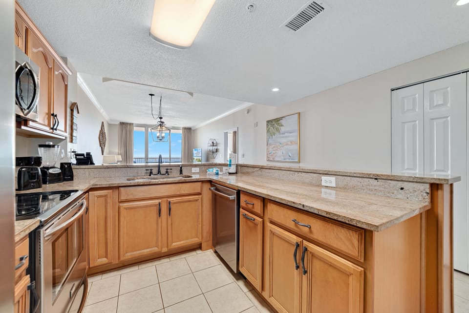 Bright and airy kitchen with ample counter space and modern amenities, creating an inviting space for cooking and gathering.