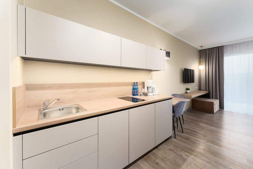 The kitchenette's practical layout maximizes space and functionality.