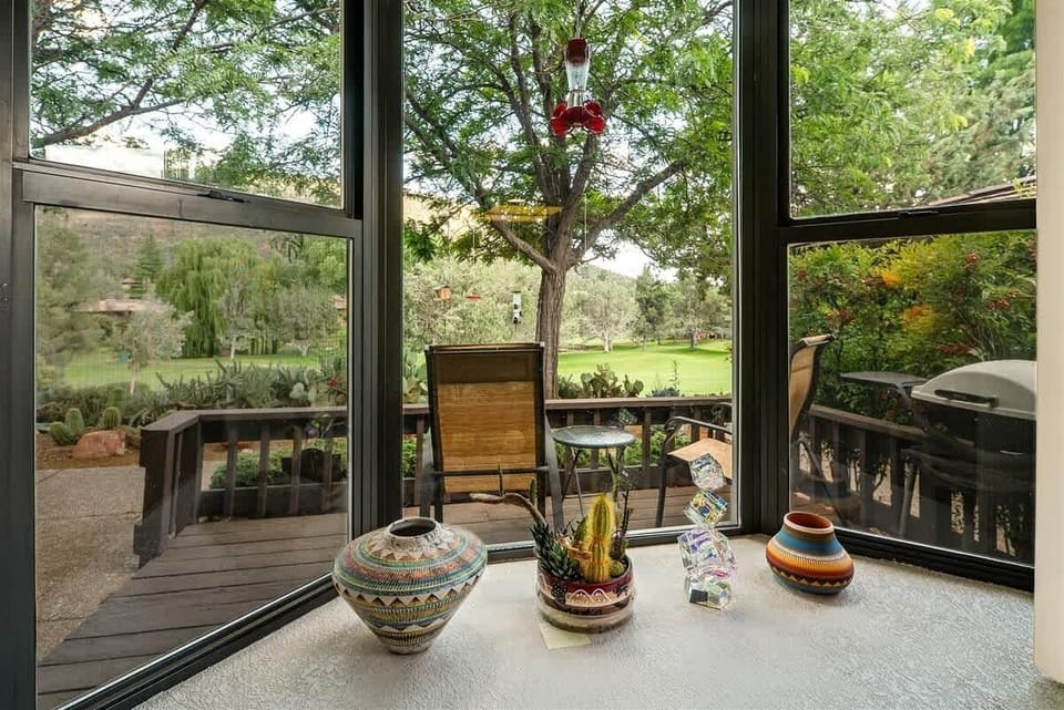 Bask in the View of the Golf Course and Greenery out the Dining Room Window