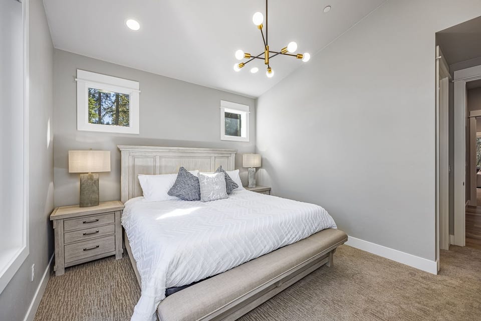 Main Floor - Bedroom 2, King Size Bed + En Suite Bathroom + Chic Decor for a Peaceful Stay