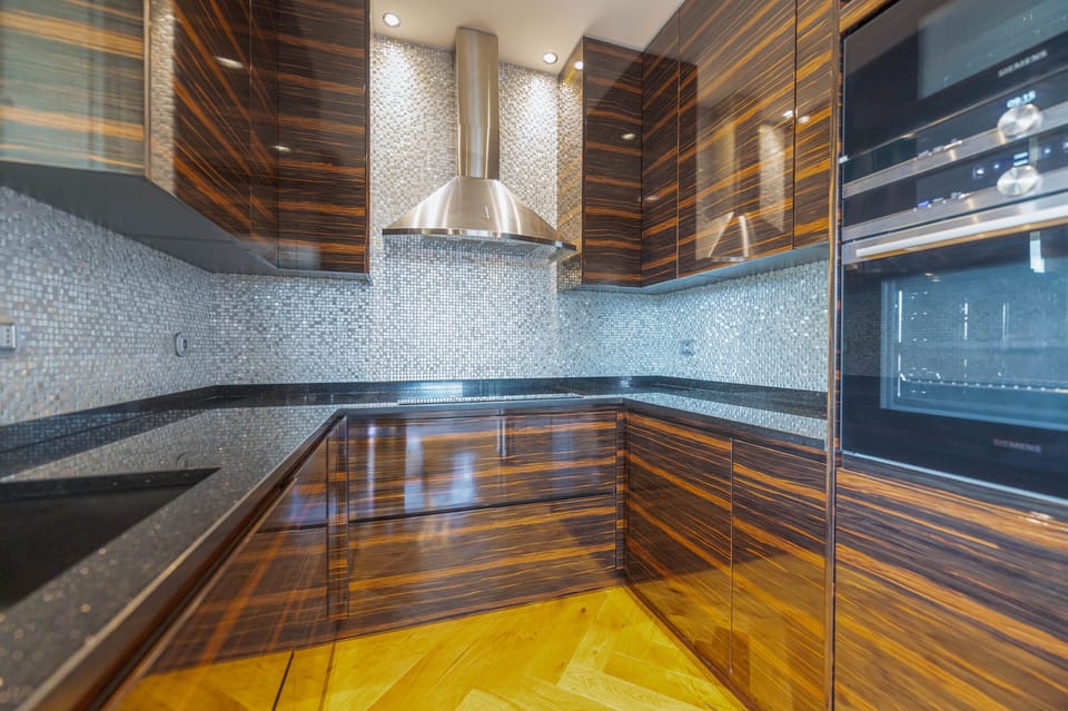 Deluxe Apartment, 2 Bedrooms | Private kitchen | Full-size fridge, microwave, oven, stovetop