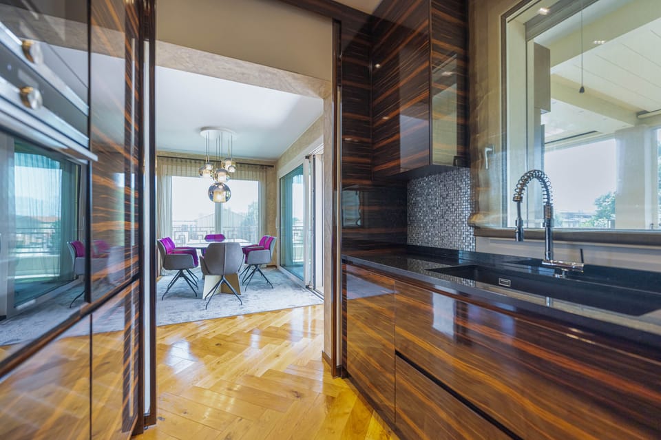 Deluxe Apartment, 2 Bedrooms | Private kitchen | Full-size fridge, microwave, oven, stovetop