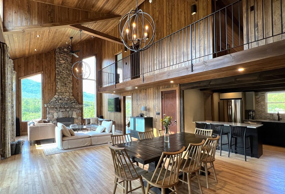 The open living plan provides plenty of space for dining, cooking, and relaxing