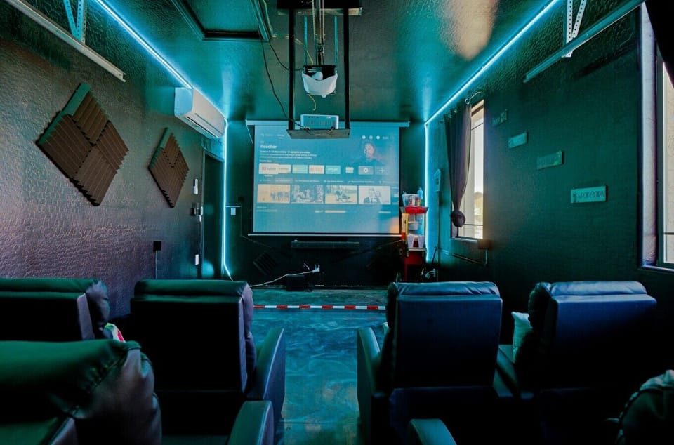 🍿 Movie Nights Made Memorable — A private cinema setup with immersive lighting, comfortable seating, and the perfect atmosphere for a cozy night in.