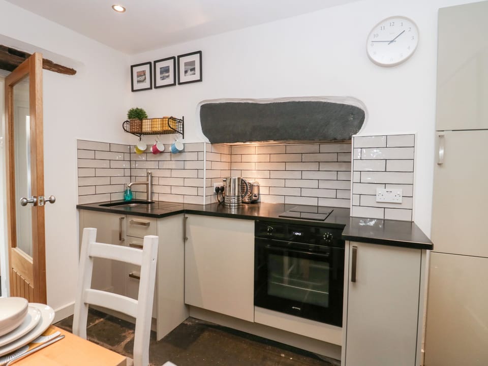 Fridge, electric kettle, toaster, cookware/dishes/utensils
