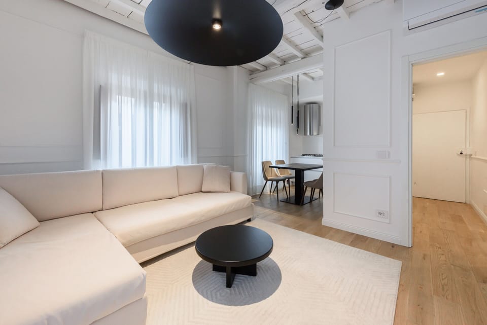 Deluxe Apartment | Living area | 40-inch flat-screen TV with digital channels