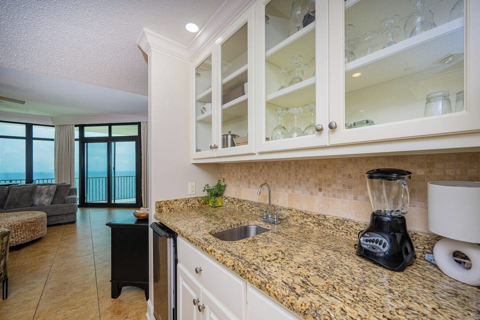 Create refreshing drinks for family gatherings at the convenient wet bar, enjoying joyful moments together