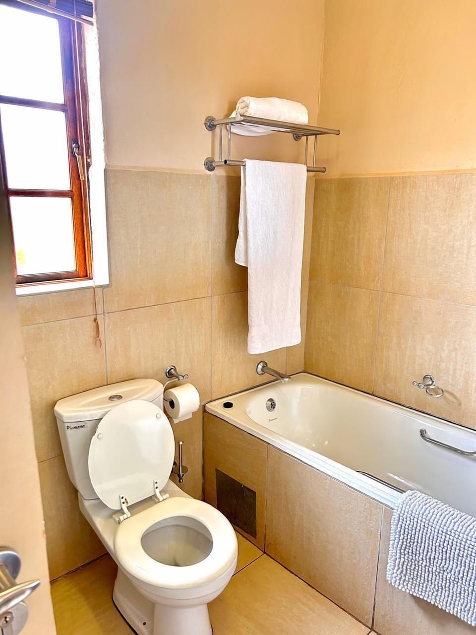 Family Room, Multiple Beds | Bathroom | Separate tub and shower, bathrobes, towels, soap