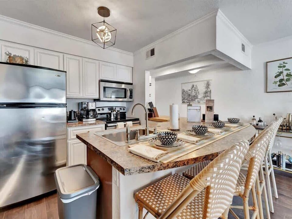 Cook up tasty dishes or enjoy great conversations around the breakfast bar — our kitchen has everything you need for your next culinary adventure!