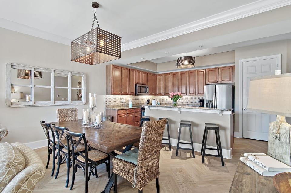 Seating at the dining table and kitchen bar. 