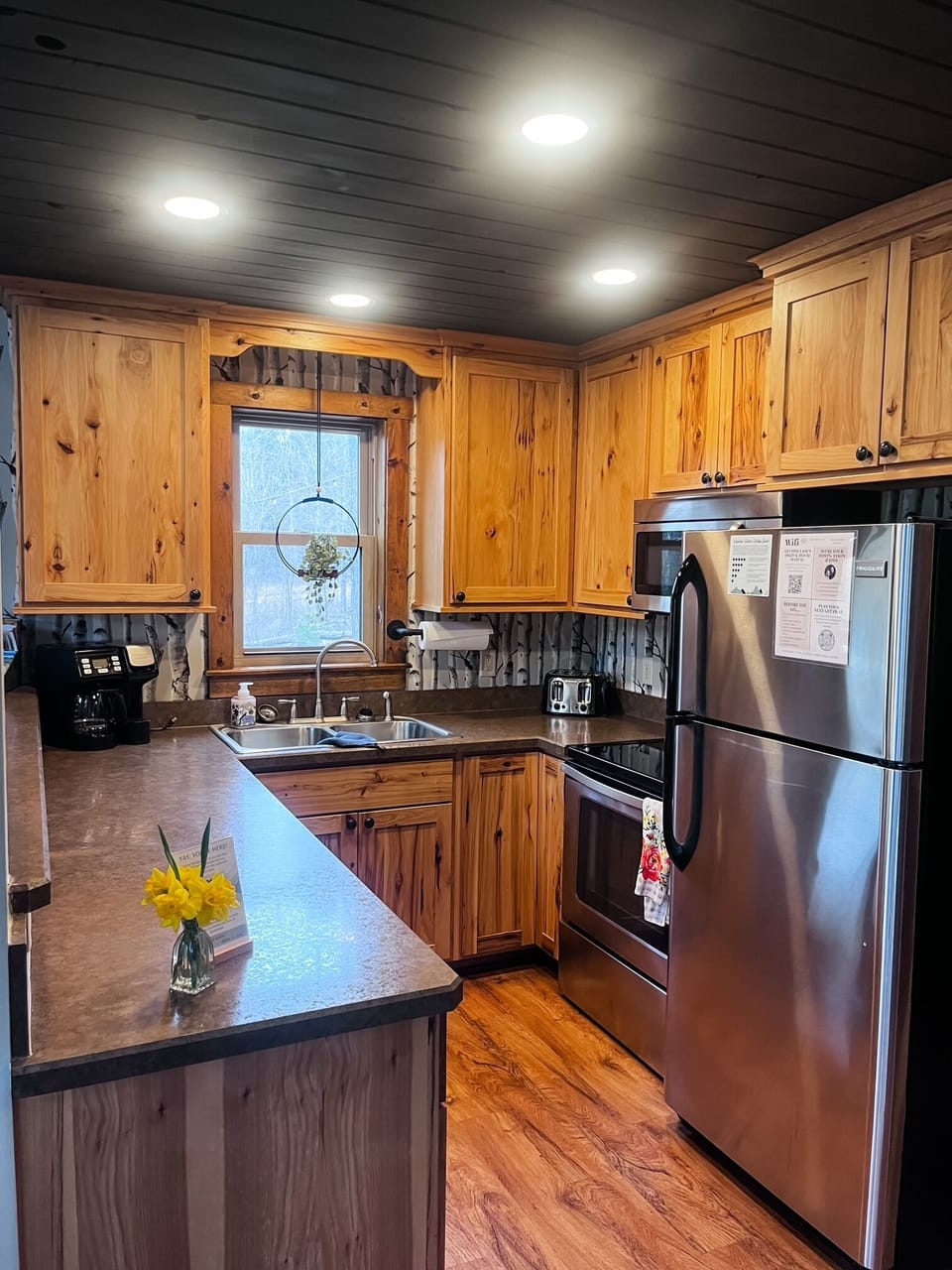 Pine Lane offers a kitchen equipped with everything you need to make a quick snack or a full meal! The coffee maker includes both drip and Keurig options.