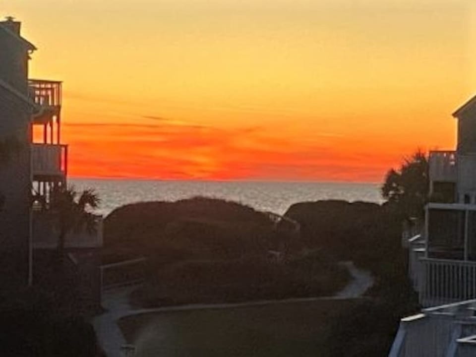 Watch the sunset from the master deck — this is what you came for, and it delivers every evening.