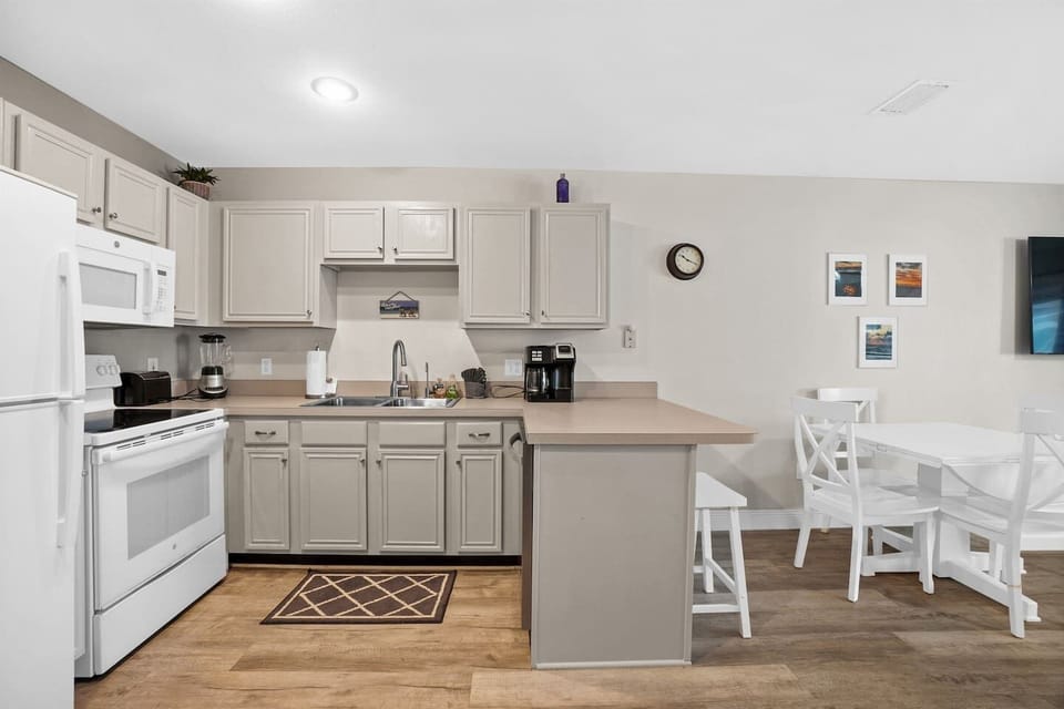 Brew the morning coffee and hit the beach — come back to a fully equipped kitchen ready for whatever you're making.