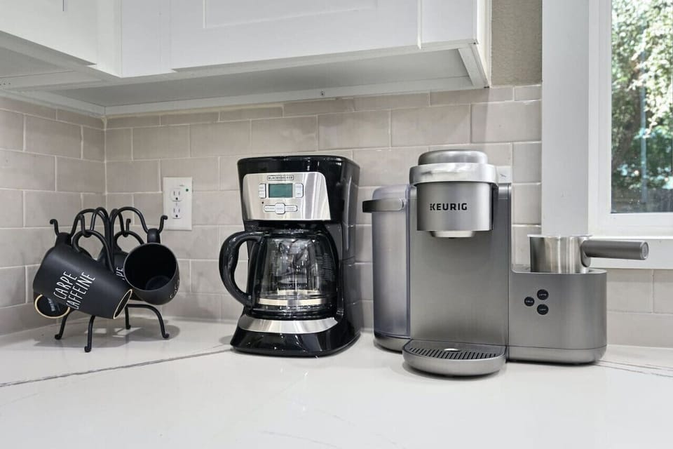 Coffee pot and Keurig!  We provide enough coffee grounds and k-cups to get you started!  Feel free to bring your favorite from home!