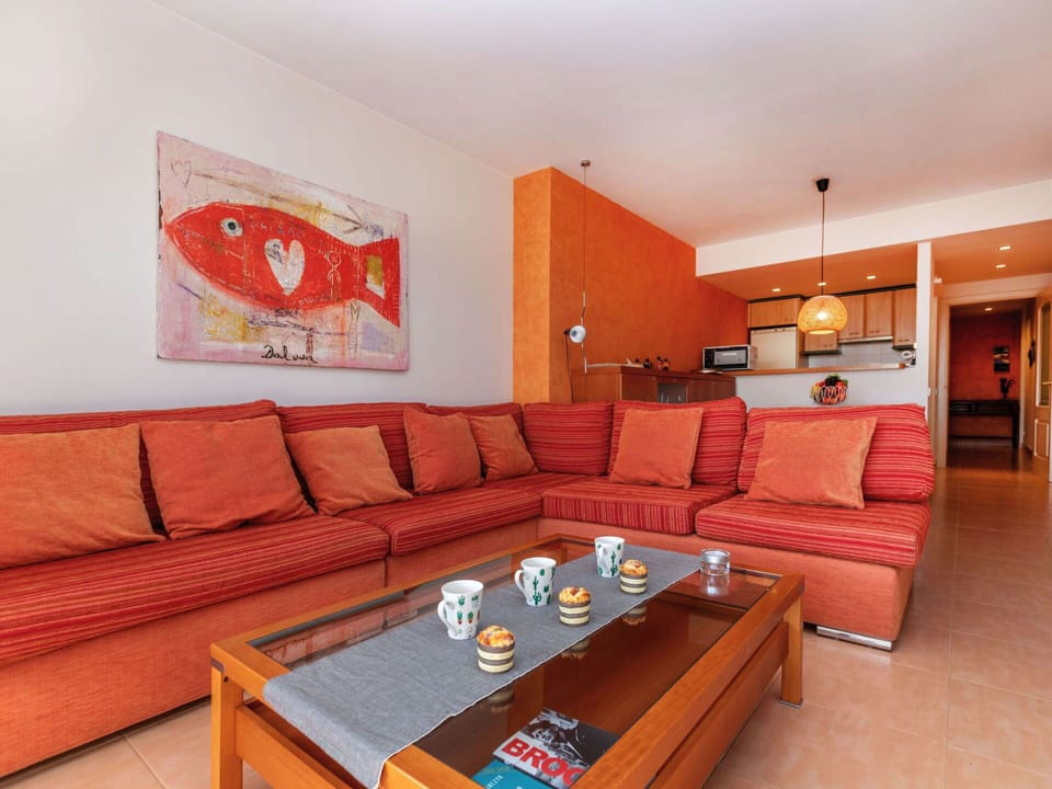 Couch, Furniture, Table, Property, Wood, Orange, Studio Couch, Interior Design, Floor, Living Room