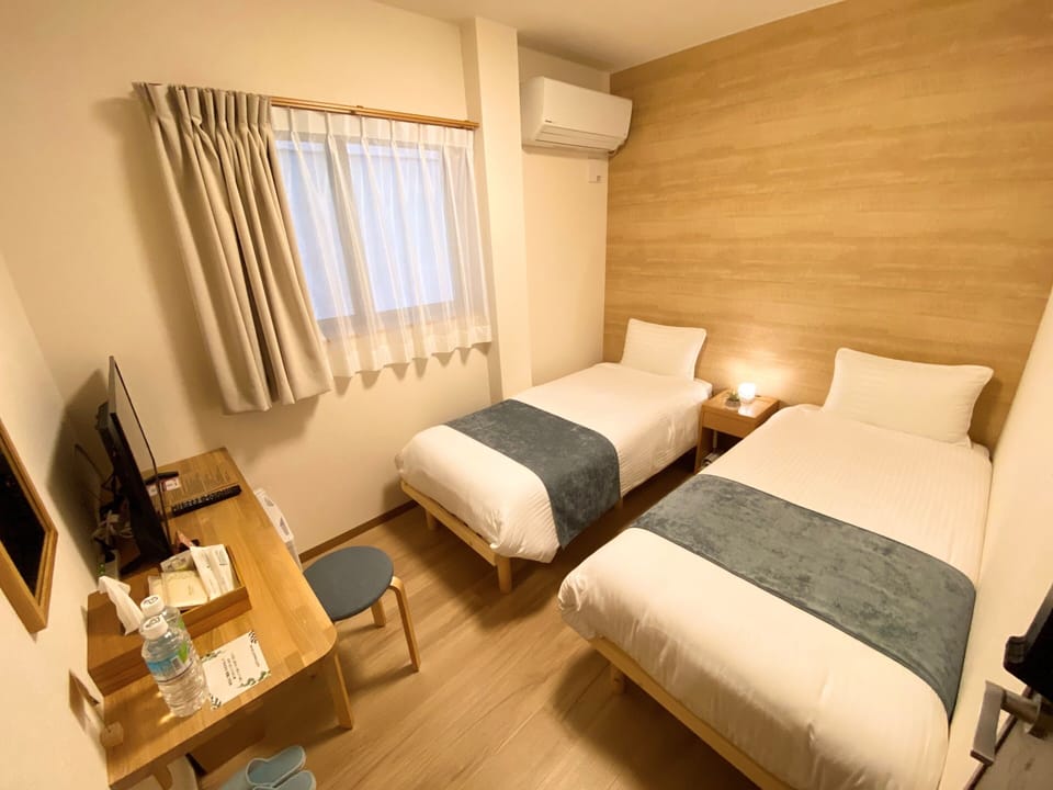 Blackout drapes, WiFi (free), bed sheets