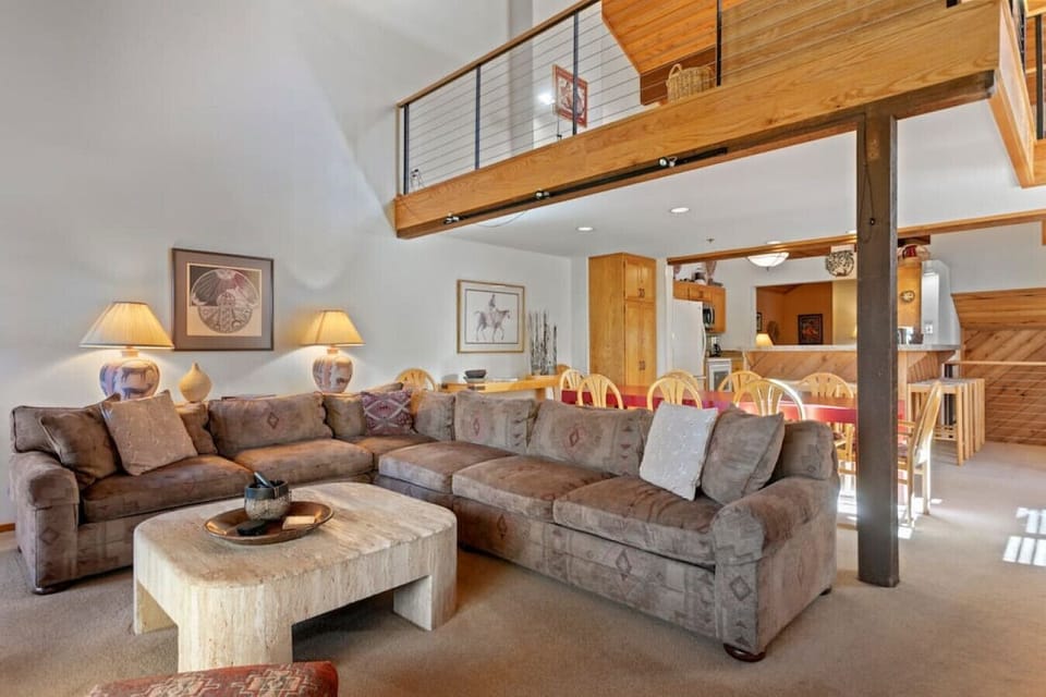 Comfortable Living Room Looking Toward the Dining Area and Kitchen