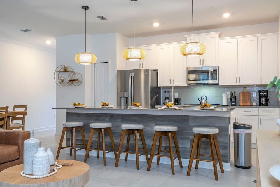  This kitchen is perfect for families and groups of friends looking to enjoy a relaxing vacation in a home away from home.
