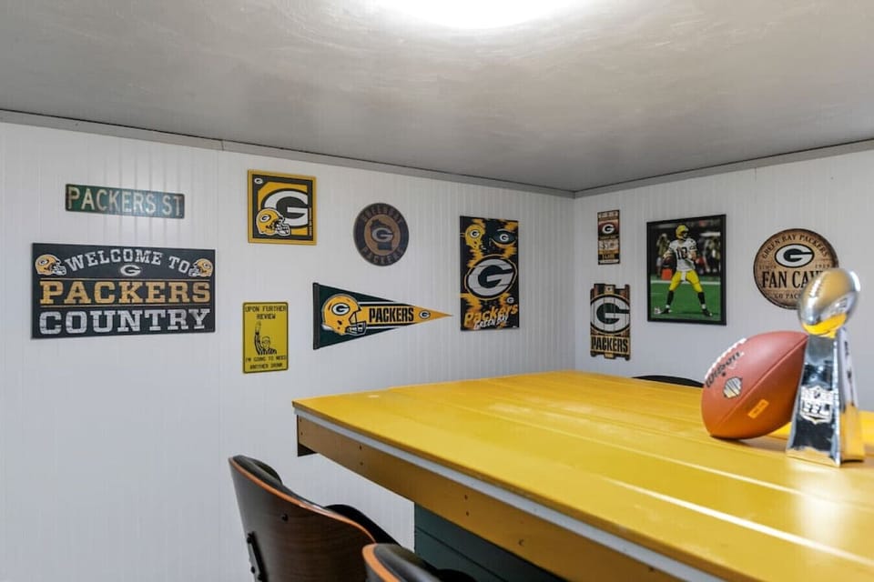 Basement has a Packer`s Bar.