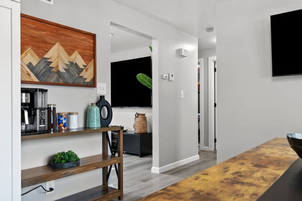 Big screen TVs throughout the house!