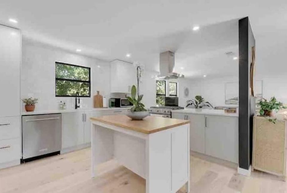chef's dream kitchen with new Kitchenaid appliances, including gas range 
