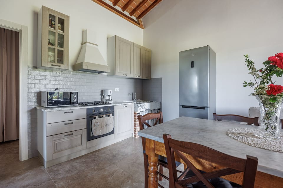 Villa | Living area | 32-inch flat-screen TV with cable channels