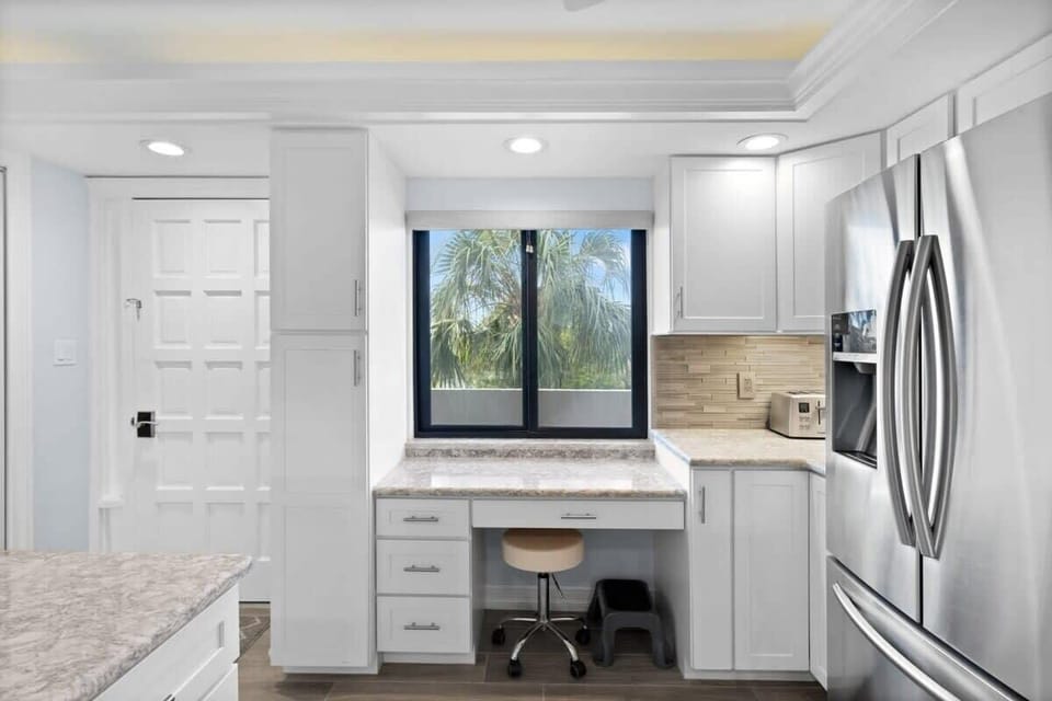 Workspace/desk area adjacent to kitchen