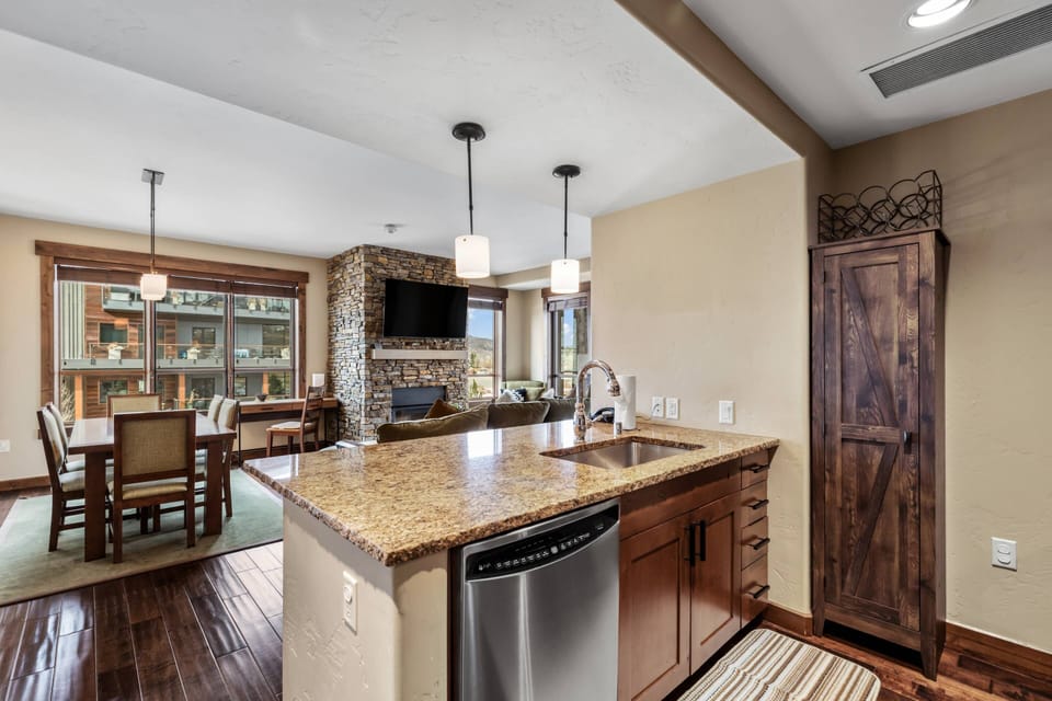 Gather around the kitchen island for breakfast planning or evening cocktails.