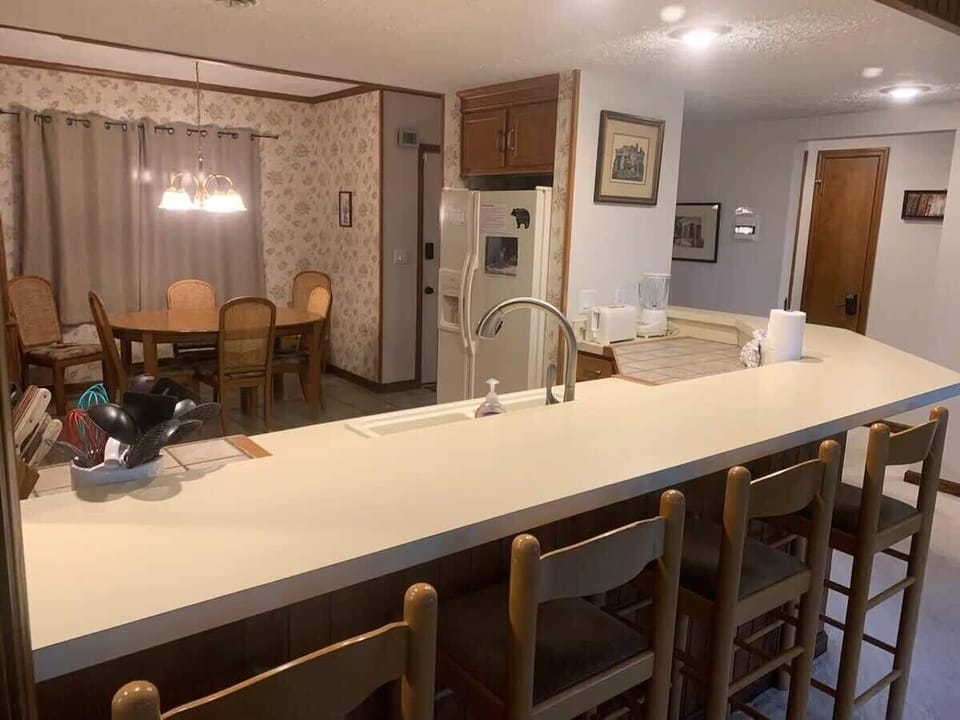 Dining Room: Gather around the charming table for delightful meals and heartwarming conversations!