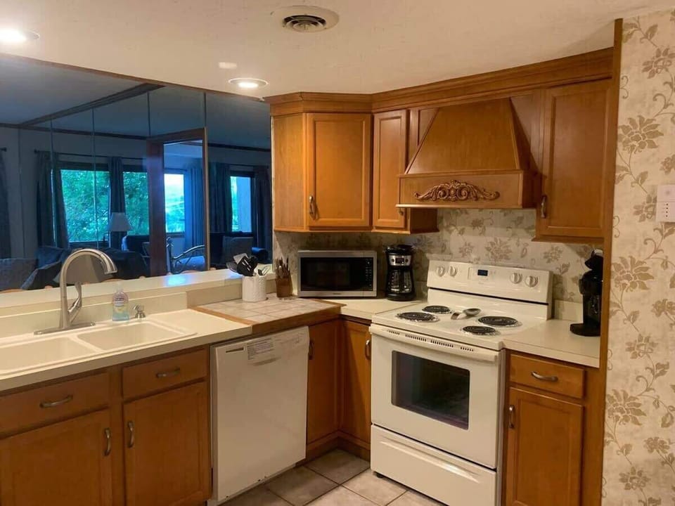  Whip up delicious meals in this well-equipped space with modern appliances and charming decor!