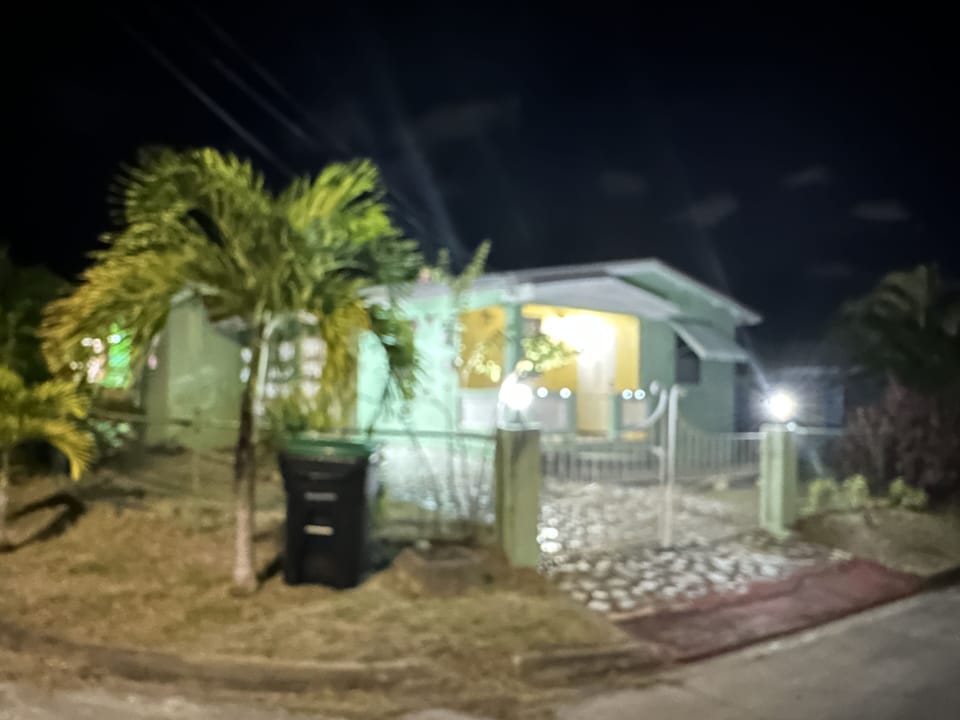Outside view - corner home with porch and back patio
