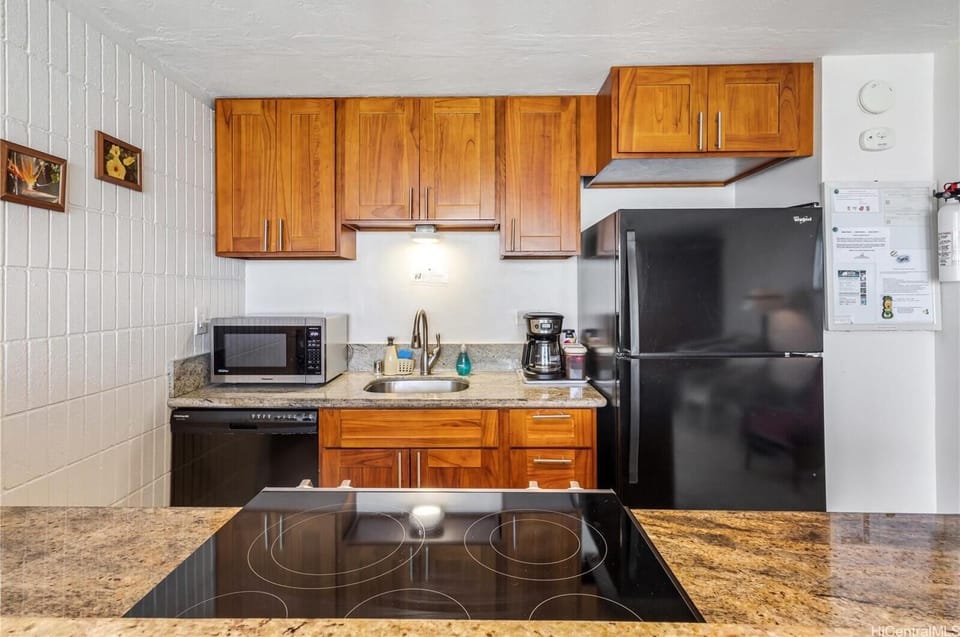 Luxury Condo | Private kitchen | Coffee/tea maker, full-size fridge, microwave, oven