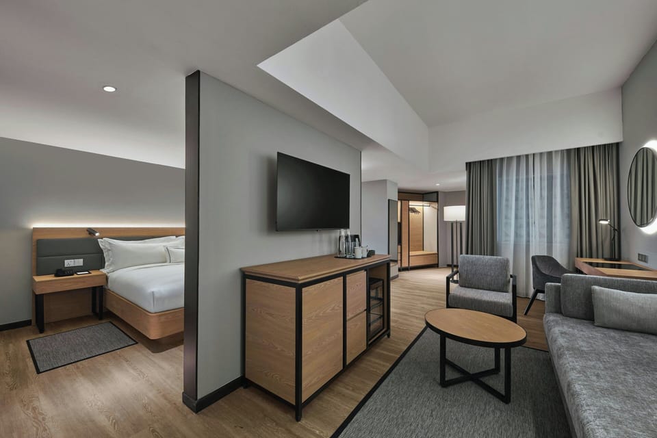 Family Suite, 1 Bedroom | In-room safe, free cribs/infant beds, rollaway beds, free WiFi