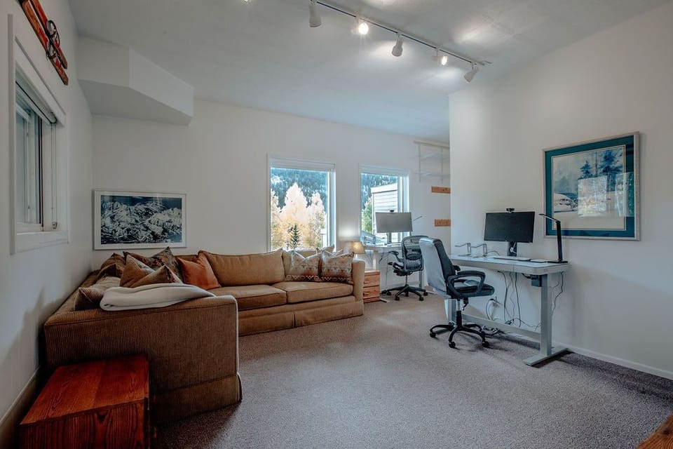 Den with Cozy Sectional Seating and Smart TV