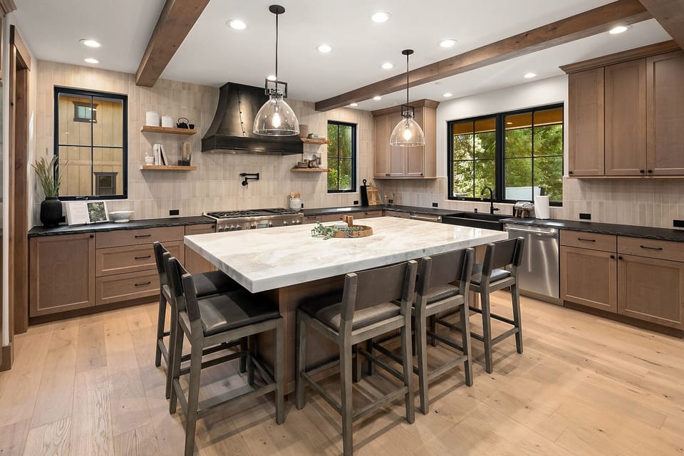Kings Landing: - Fully stocked chef's kitchen with seating for 5 around the oversized island.