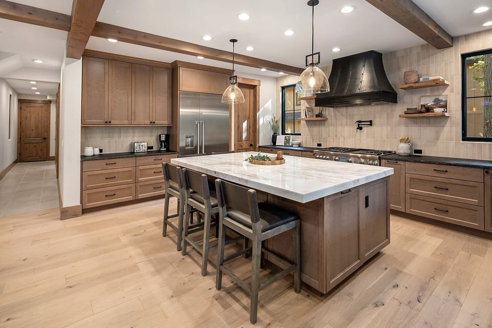 Kings Landing: - The large kitchen features stainless Thermador appliances, and quartz countertops.
