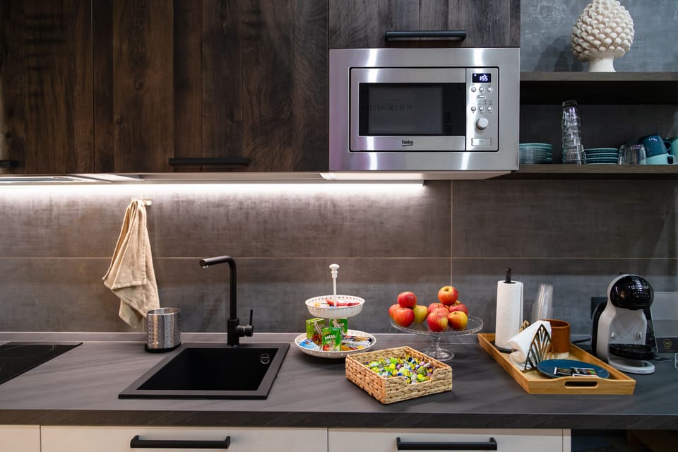 Mini-fridge, microwave, stovetop, cookware/dishes/utensils