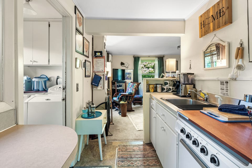 The kitchen — full service for eight and a coffee bar most cafés would envy.