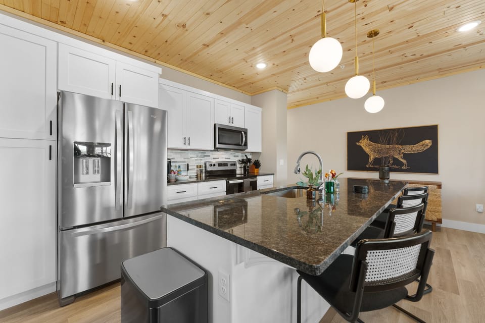 Gourmet Kitchen: Whip up culinary creations amid sleek surfaces and modern appliances!