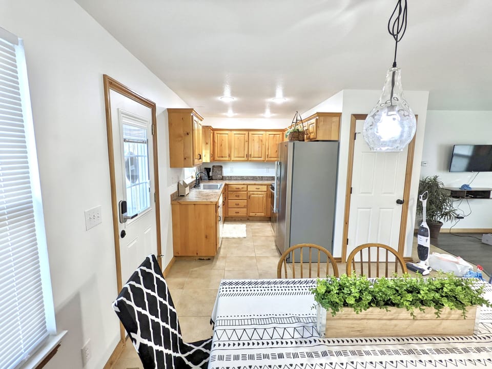 Eating in is no problem with this standard galley kitchen stocked with all your basic needs.