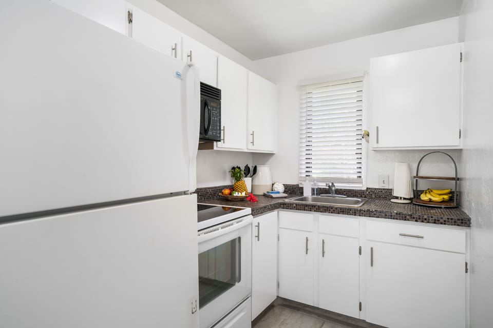Well Stocked Kitchen w/laundry closet
