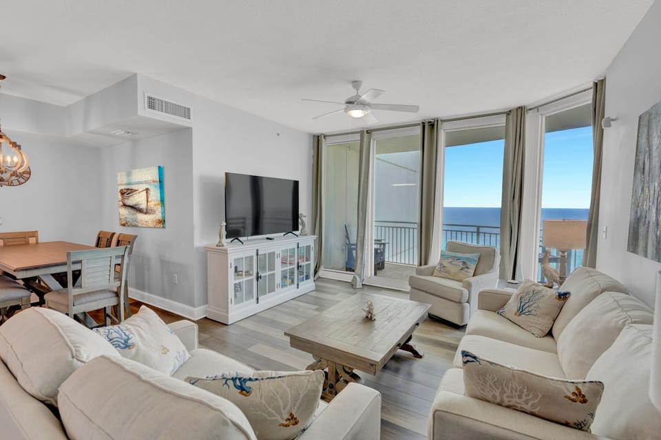 The Living Room features a large Smart TV, board games, plenty of seating, a Queen Sleeper Sofa, and GULF VIEWS!