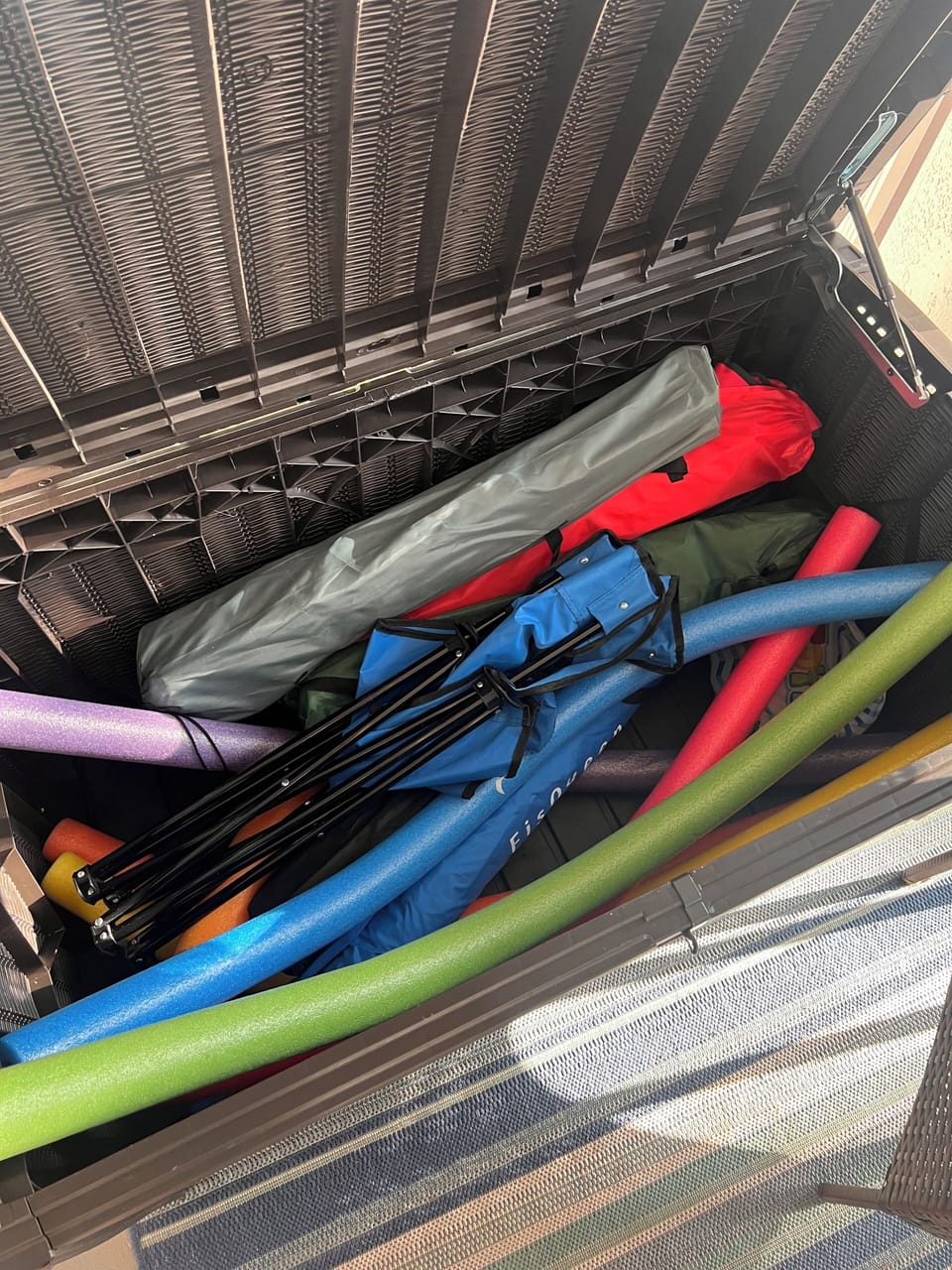 Pool toys, folding chairs, beach umbrella, & Tommy Bahama chairs available.