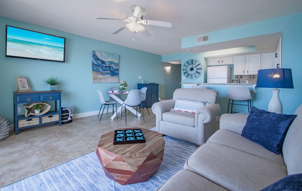 Open concept living room, dining & kitchen